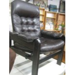 Mid century style easy chair with brown leatherette upholstered seat