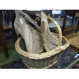 Wicker basket containing drift wood