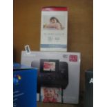 Canon photo printer and pack of paper and ink