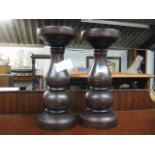 Pair of turned wooden candle sticks