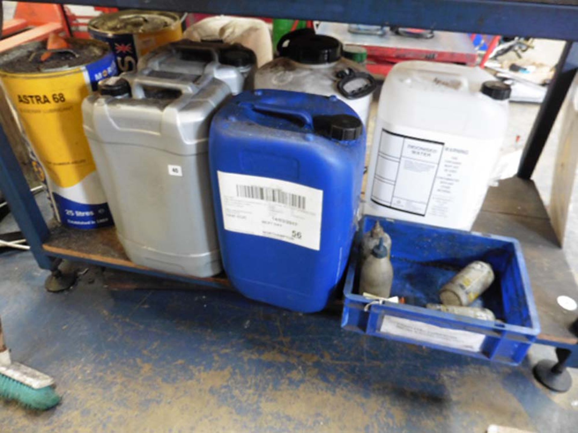 Quantity of various part tubs of lubricant, de-ionised water, cutting fluid etc