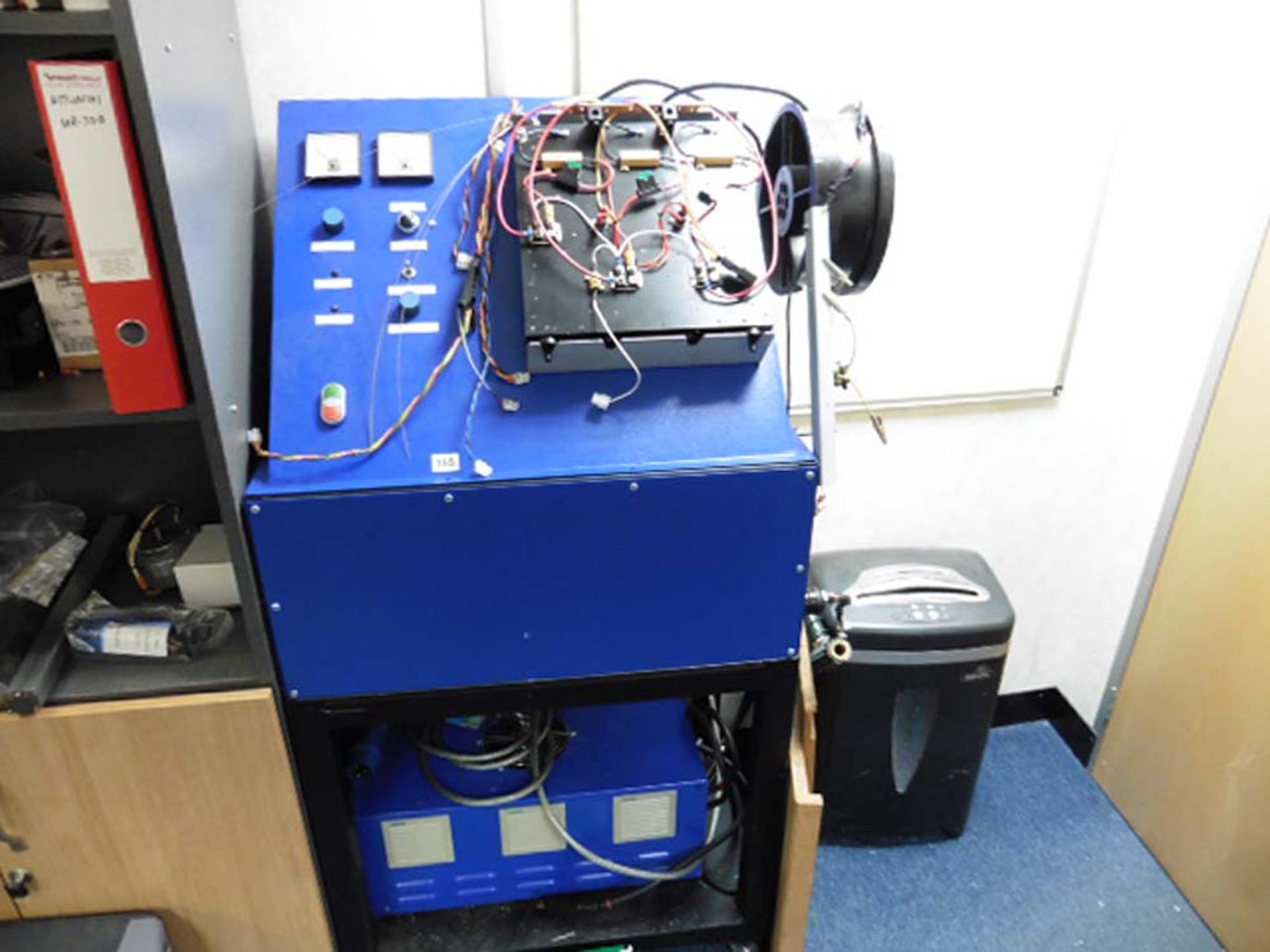 A specialist test jig with heat sink, fans etc