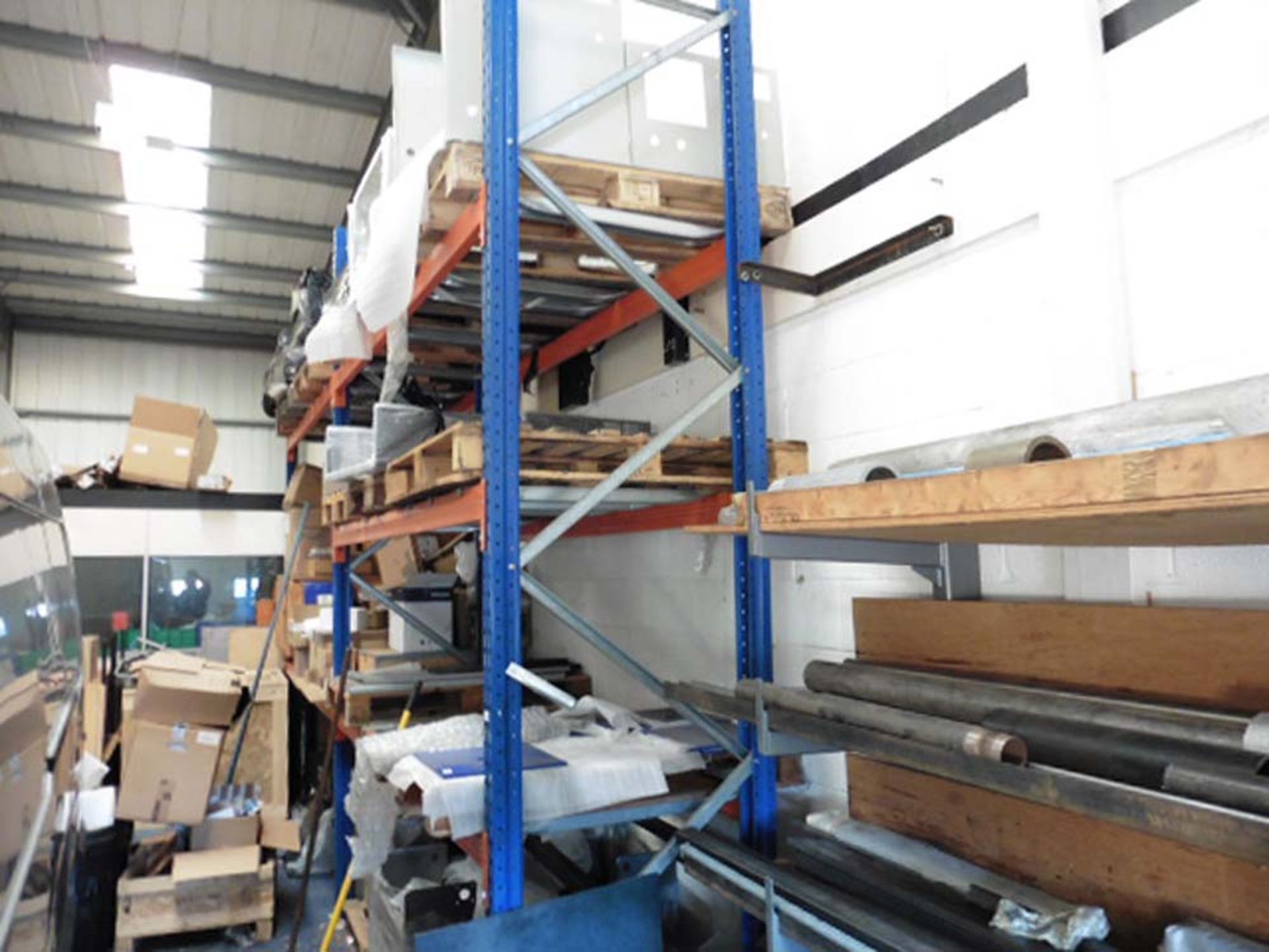 a Double bay of pallet racking comprising 3 blue 14' uprights and 5 pairs of beams