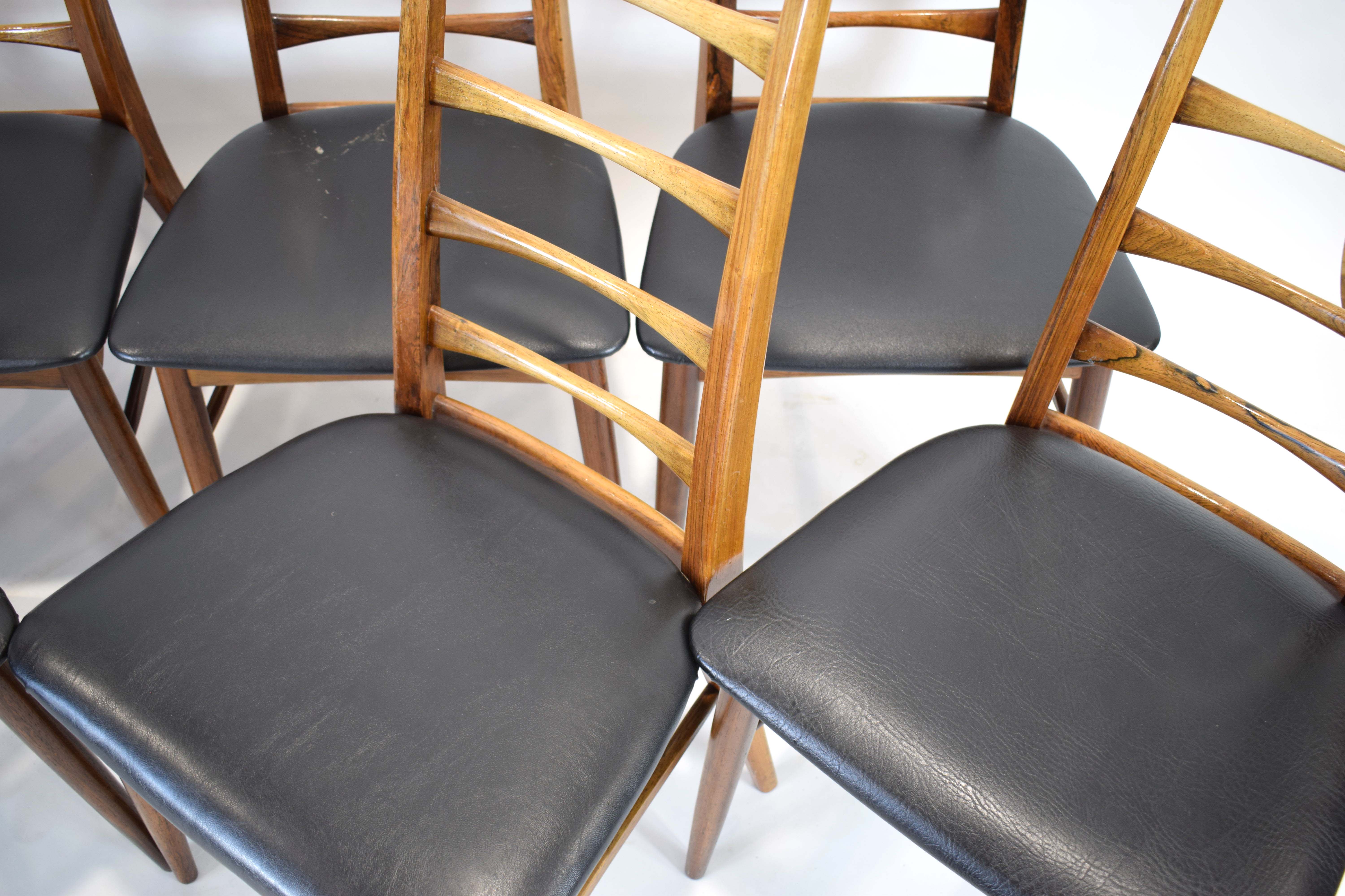 Niels Koefoed for Koefoeds Hornslet, a set of eight 1960's rosewood Lis chairs with black seats, - Image 5 of 19