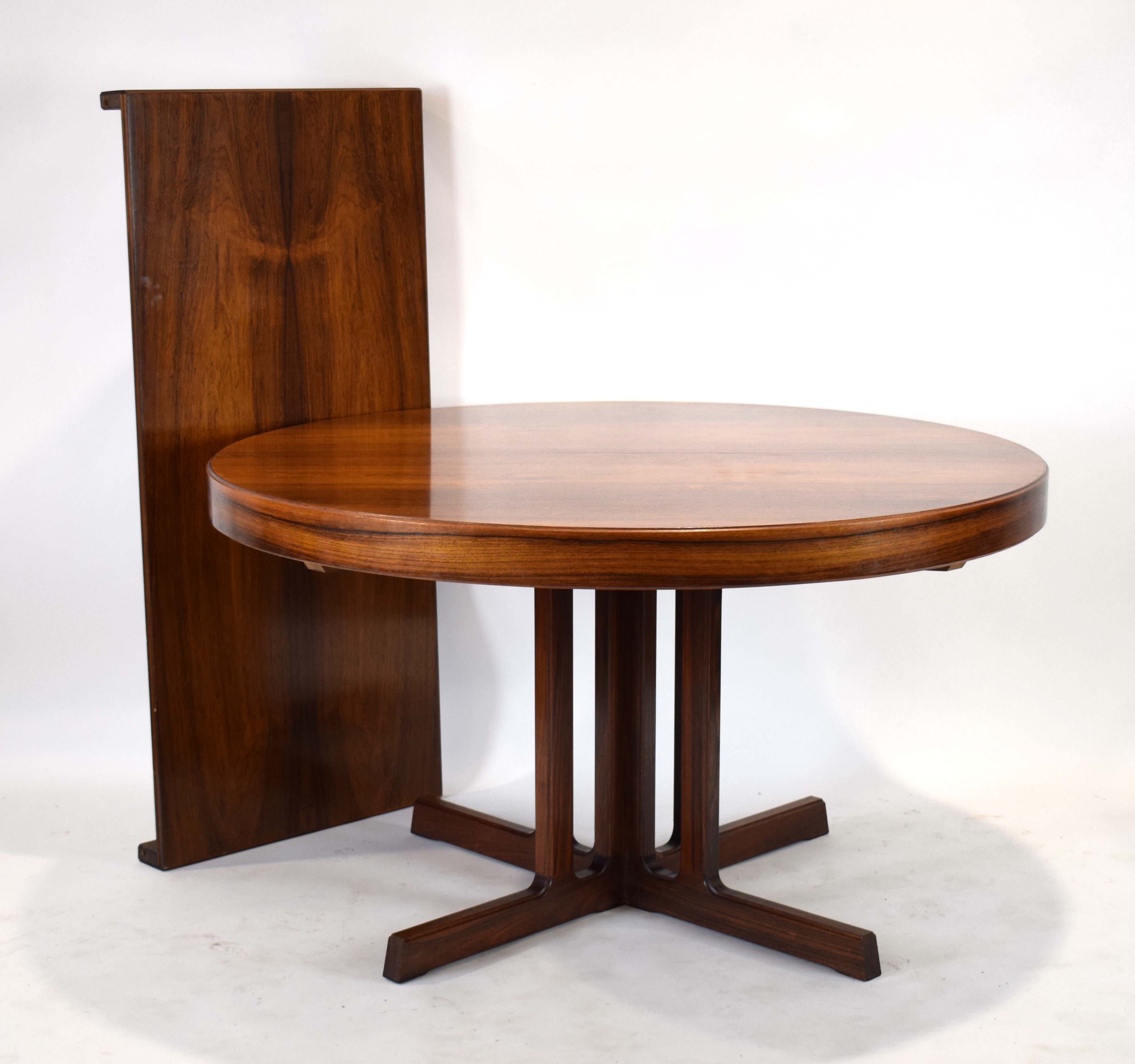 A 1960's Danish rosewood and crossbanded extending dining table, 130 cm to 190 cm,