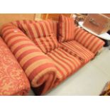 Maroon and gold striped two seater sofa