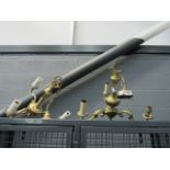 5551 - A pair of brass three branch ceiling lights