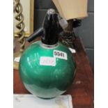 A green painted soda syphon