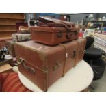 Canvas travelling trunk with wooden ribs, plus a vintage case and a leather briefcase