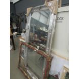 Rectangular bevelled mirror in decorative silver frame