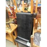 5129 A pair of black leather effect dining chairs