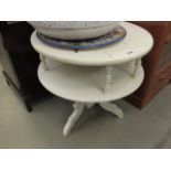 Cream painted two tier circular table