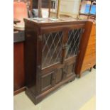 Dark wood 2 door glazed display cupboard with 2 doors underneath