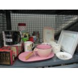 5575 - A cage containing photo frames, kitchen storage vessels, coffee mugs, plus a soup bowl and