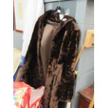 A brown fur ladies coat