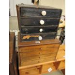 2 miniature sets of drawers