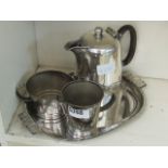 A silver plated four piece teaset, to include a tray