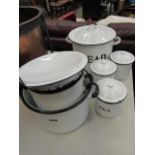 A quantity of enamelled kitchen pots