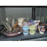 A cage containing a glass water jug, ornamental corkscrews, photoframe, Belleeck vase, plus 1950's