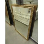 Rectangular bevelled mirror in gilt frame