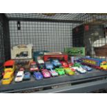 A cage containing die-cast toy cars