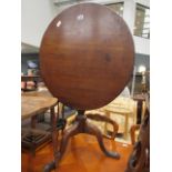 Tilt top circular table with two chairs