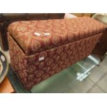 Ottoman in red and gold floral fabric
