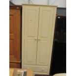 Cream painted double door cupboard with two drawers under