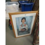A Modigliani print of girl with cushion