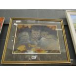Framed and glazed painting by Marie Heys depicting wild cats