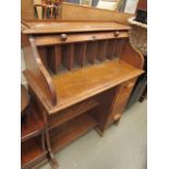 Oak rolled top desk with drawers to the side