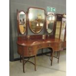 Kidney shaped dressing table on castors with 3 section mirror