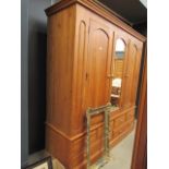 Large 3 door pine wardrobe with 6 assorted drawers below