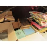 One boxes containing children's encyclopedia, reference books and novels