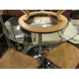 Circular glass top dining table