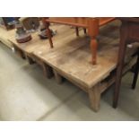 Pair of rustic coffee tables with carved supports