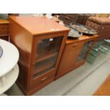 Two teak finished and glazed hi-fi and TV cabinets