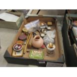Box containing furniture knobs, lead figures, clippers, tins