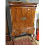 Mahogany double door drinks cabinet on ball and claw supports