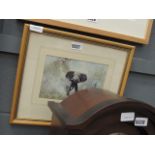 A framed and glazed print of an African elephant