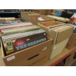 2 boxes containing vinyl records