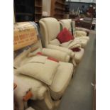 Cream and beige floral tow seater cottage sofa plus a pair of matching armchairs