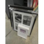 Two photo frames, two urban wall hangings depicting Paris and New York, plus a cork pin board