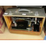 Cased Singer sewing machine