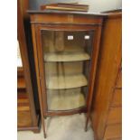 Glaze fronted display cabinet on tapered legs