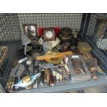 A cage containing penknives, hip flasks, alarm clock, treen and ornaments