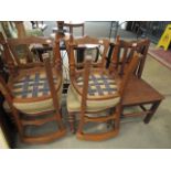 Four upholstered carved Edwardian dining chairs