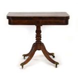 A Regency mahogany games table,