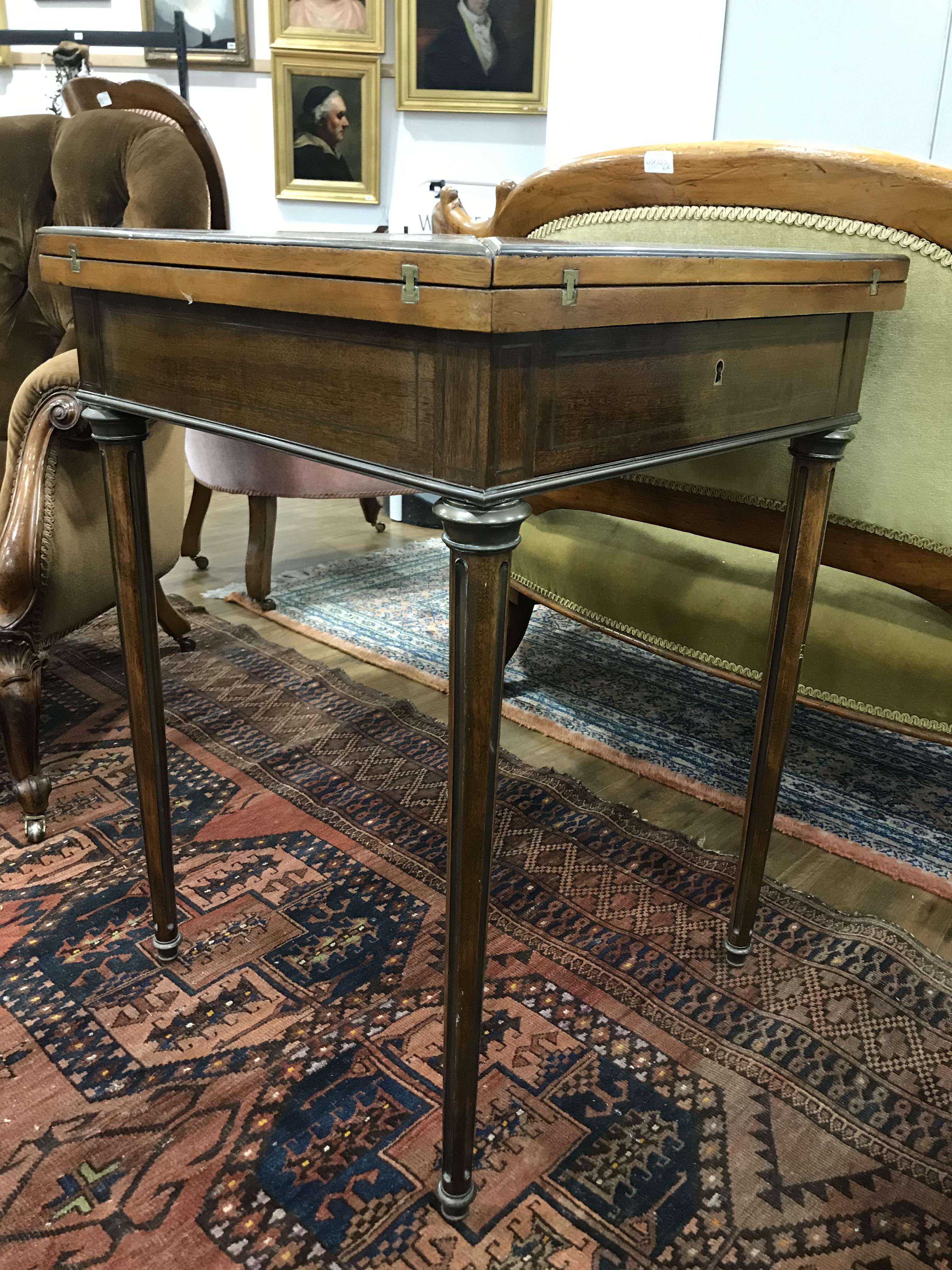 A mahogany and brass mounted envelope games table, - Image 7 of 7