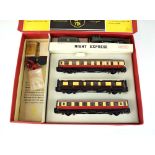 A Trix Twin OO gauge Night Express train set comprising 4-2-0 loco, tender,